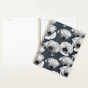 White poppies on navy planner