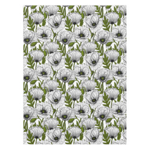 White poppies on white tablecloth