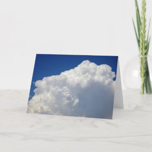 White Puffy Clouds in Blue Sky Background Card