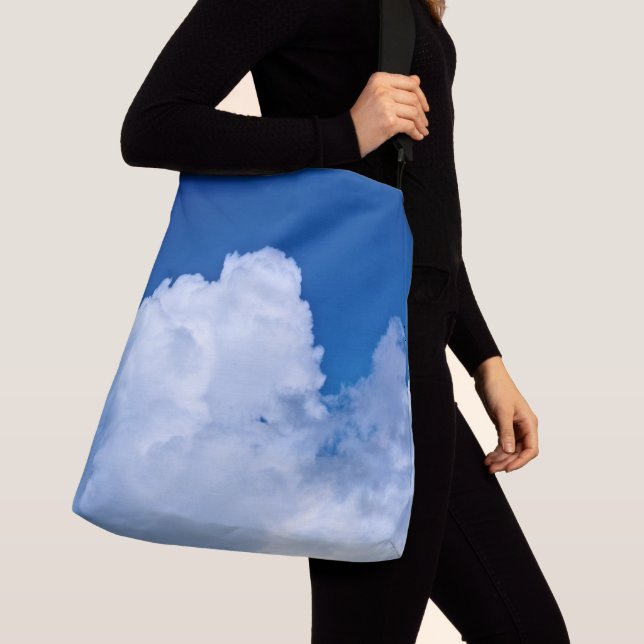 White puffy clouds in blue sky crossbody bag (Close Up)