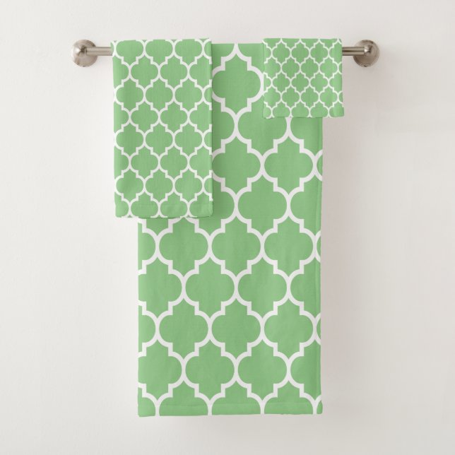 White quatrefoil pattern on green bath towel set (Insitu)