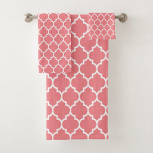 White quatrefoil pattern on pink bath towel set