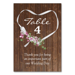 White Ribbon Heart On Barn Wood Table Number