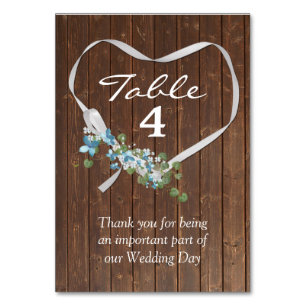 White Ribbon Heart On Barn Wood Table Number