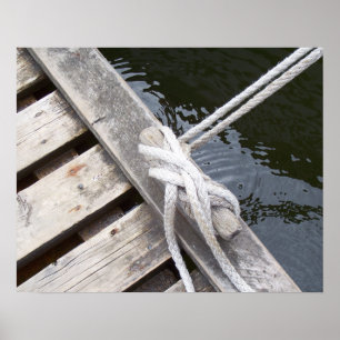 White Rope Tied to Cleat on Wood Plank Dock Poster