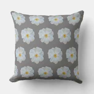 White rose on grey background. throw pillow