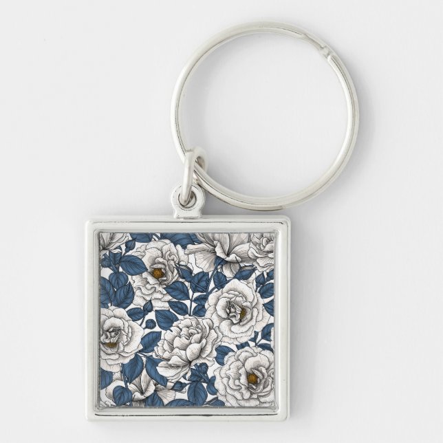 White roses with blue leaves on white keychain (Front)