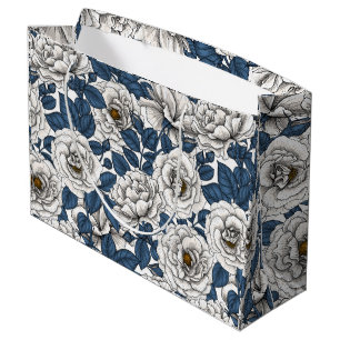 White roses with blue leaves on white large gift bag