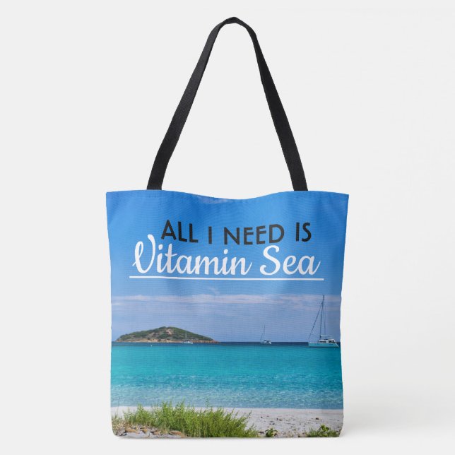 white sand beach with turquoise water and sailboat tote bag (Back)
