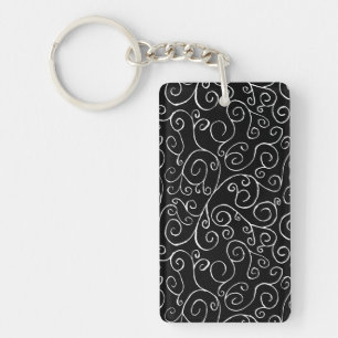 White Scrolling Curves on Black Keychain