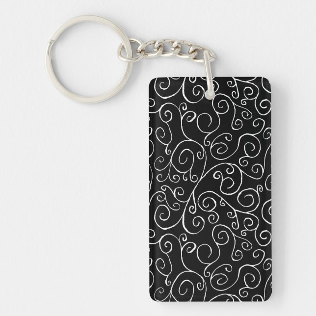 White Scrolling Curves on Black Keychain (Front)