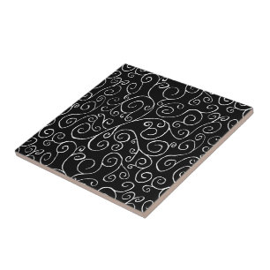 White Scrolling Curves on Black Tile