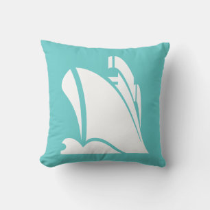 white ship on teal blue pillow