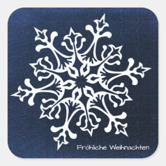 White Snowflake on Blue Fröhliche Weihnachten Square Sticker