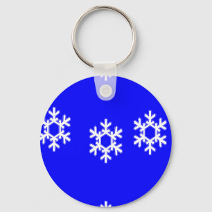 White snowflakes on blue keychain