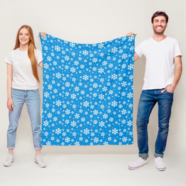 White Snowflakes on Mid Blue Winter Pattern Fleece Blanket (In Situ)