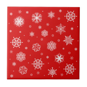 White snowflakes on red background tile