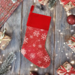 White Snowflakes Ruby Red Christmas Stocking<br><div class="desc">White snowflakes and snow in a backdrop of ruby red.</div>