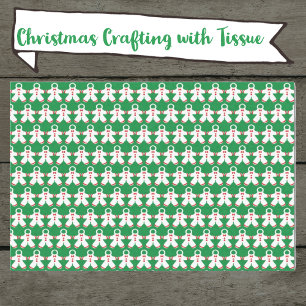 White snowsuits on Green Tissue Paper