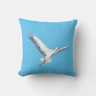 White stork flying throw pillow