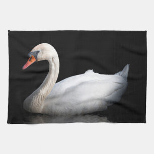 White swan on black kitchen towel