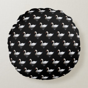 White swan on black round pillow