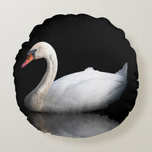 White swan on black round pillow