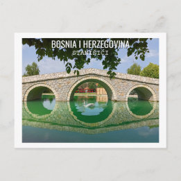 White swan under the arch bridge postcard