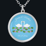 White Swans and Water lilies Wedding Custom Silver Plated Necklace<br><div class="desc">This beautiful Wedding necklace features a digital art image of a pair of beautiful white swans with orange becks facing each other looking like they are kissing. Underneath the swans is a group of pretty pink water lily flowers with yellow centres and green lily pads. A beautiful wedding design. There...</div>