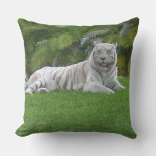 White Tiger Relaxing in Lush Green Grass Throw Pillow