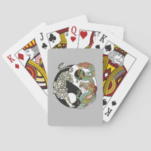 White tiger versus green dragon in the yin yang playing cards