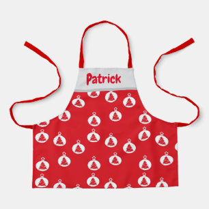 White tree ornaments on red apron