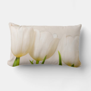 White tulips against a white background, lumbar pillow