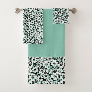White, turquoise flowers on black.  bath towel set
