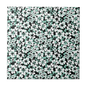 White, turquoise flowers on black. tile