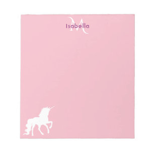 White unicorn on pastel pink monogrammed notepad