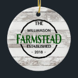 White Wood Farmhouse Family Name Christmas Ceramic Ornament<br><div class="desc">Add a rustic touch of farmhouse style to your Christmas tree with this rustic, white, farmhouse style clock. Easily personalize with your family name and the year your home/farm was established. Makes a great gift for newlyweds or anyone who loves the farmhouse style! Will be part of a collection. If...</div>