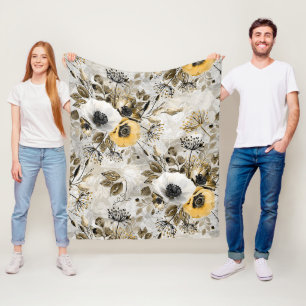 White, yellow anemones on a grey-brown background. fleece blanket