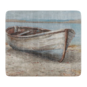 Whitewashed Boat on the Shore Cutting Board