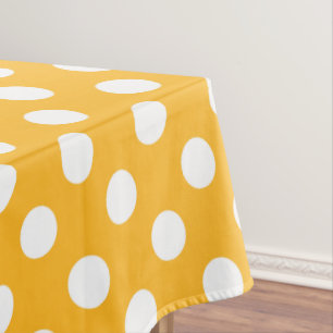 Whitle polka dots on yellow tablecloth