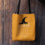 Wicked Cute Personalized Halloween Tote Bag<br><div class="desc">Send your little trick-or-treater out with this adorable personalized bag in festive Halloween orange,  featuring "wicked cute" in white topped with a black witch's hat illustration. Personalize with a name in white modern script lettering.</div>