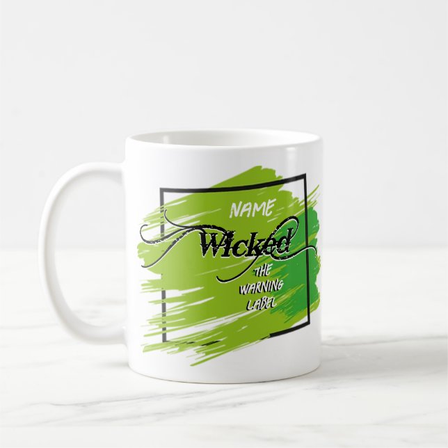 Wicked the warning label personalized coffee cup (Left)