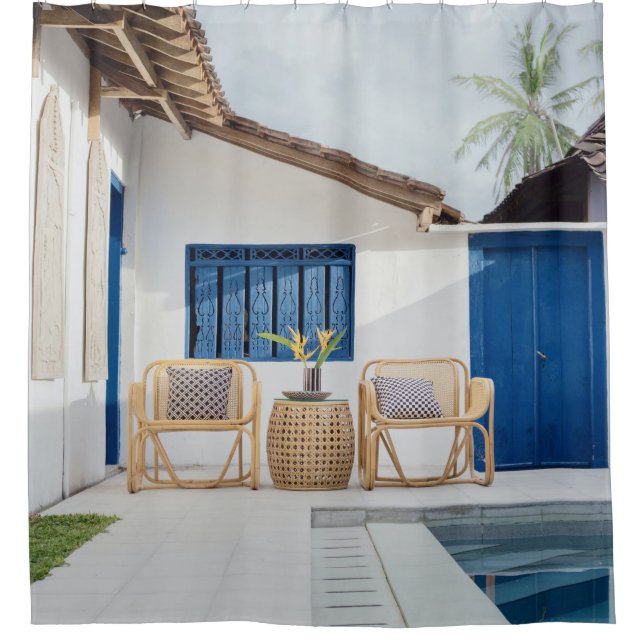 Wicker table and two chairs near swimming pool (Front)
