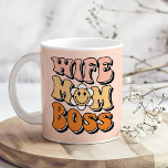 "Wife Mom Boss" Blush Pink Groovy Retro Coffee Mug<br><div class="desc">Celebrate the dynamic woman in your life with the "Blush Pink Groovy Wife Mom Boss Coffee Mug." This stylish mug features a groovy design with the empowering words "Wife, Mom, Boss" in playful, retro-inspired typography. The soft blush pink background adds a touch of elegance and femininity, making it a perfect...</div>