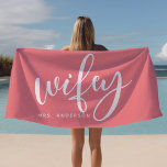 Wifey Pink And White Newlywed Bride Beach Towel<br><div class="desc">Embrace your newlywed status with this stylish "Wifey" beach towel in pink and white, perfect for honeymoons, beach days, or poolside relaxation. Designed for brides and newlyweds, this towel can be personalized with a last name, making it a thoughtful gift or personal accessory. Whether lounging by the beach or pool,...</div>