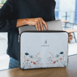 Wild Floral Laptop Sleeve<br><div class="desc">The Wild Floral Laptop Sleeve on a dusty blue background offers a beautiful blend of natural and rustic charm. Designed with wildflowers in subtle, earthy colours over a soothing dusty blue backdrop, this Laptop Sleeve adds a unique and stylish aesthetic to your daily business or personal routine. The floral design...</div>