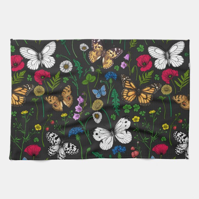 Wild flowers and butterflies on black kitchen towel (Horizontal)