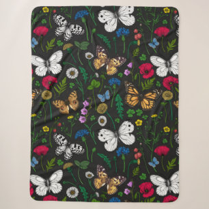 Wild flowers and butterflies on black sherpa blanket