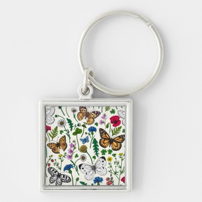Wild flowers and butterflies on white keychain (Front)