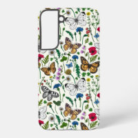 Wild flowers and butterflies on white